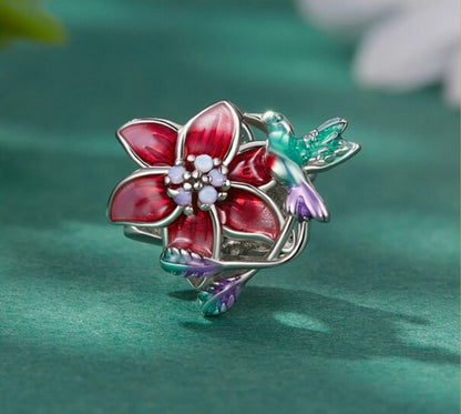 Red flower with bird of paradise - Charm