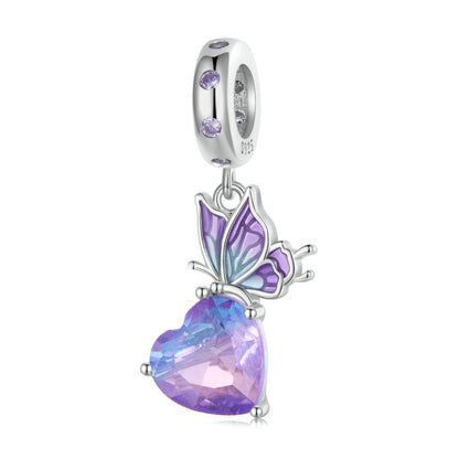 Butterfly with heart - charm pendant