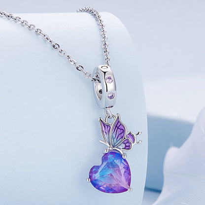 Butterfly with heart - charm pendant